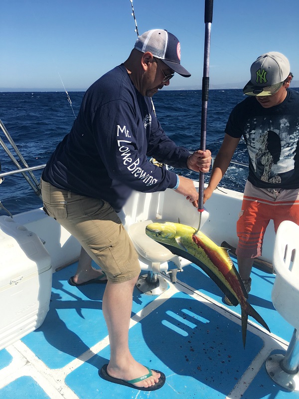 VIP Guests visiting from Sierra Madre, California Kris Lowe and Dan Bell have Dorado on the menu!