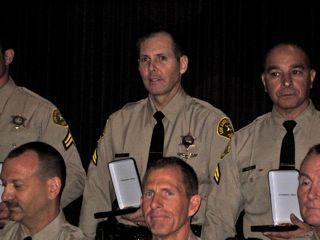 It is with great pride that Sheriff Baca presents members of the Special Enforcement Bureau and Aero Bureau with the Department’s Exemplary Service Award.￼