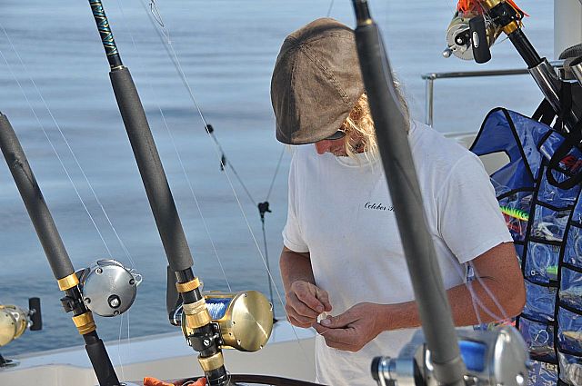 Captain Robert getting things set up .. experienced fishing aboard this magnificent 70′ yacht – what a combination!