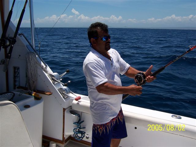 Capt Hector reeling in a dorado .. to be weighed in at Bisbees East Cape Offshore Event .. f￼