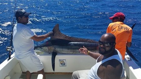 celebrating Alvins Birthday and Rhoni says he caught a -Birthday Marlin
